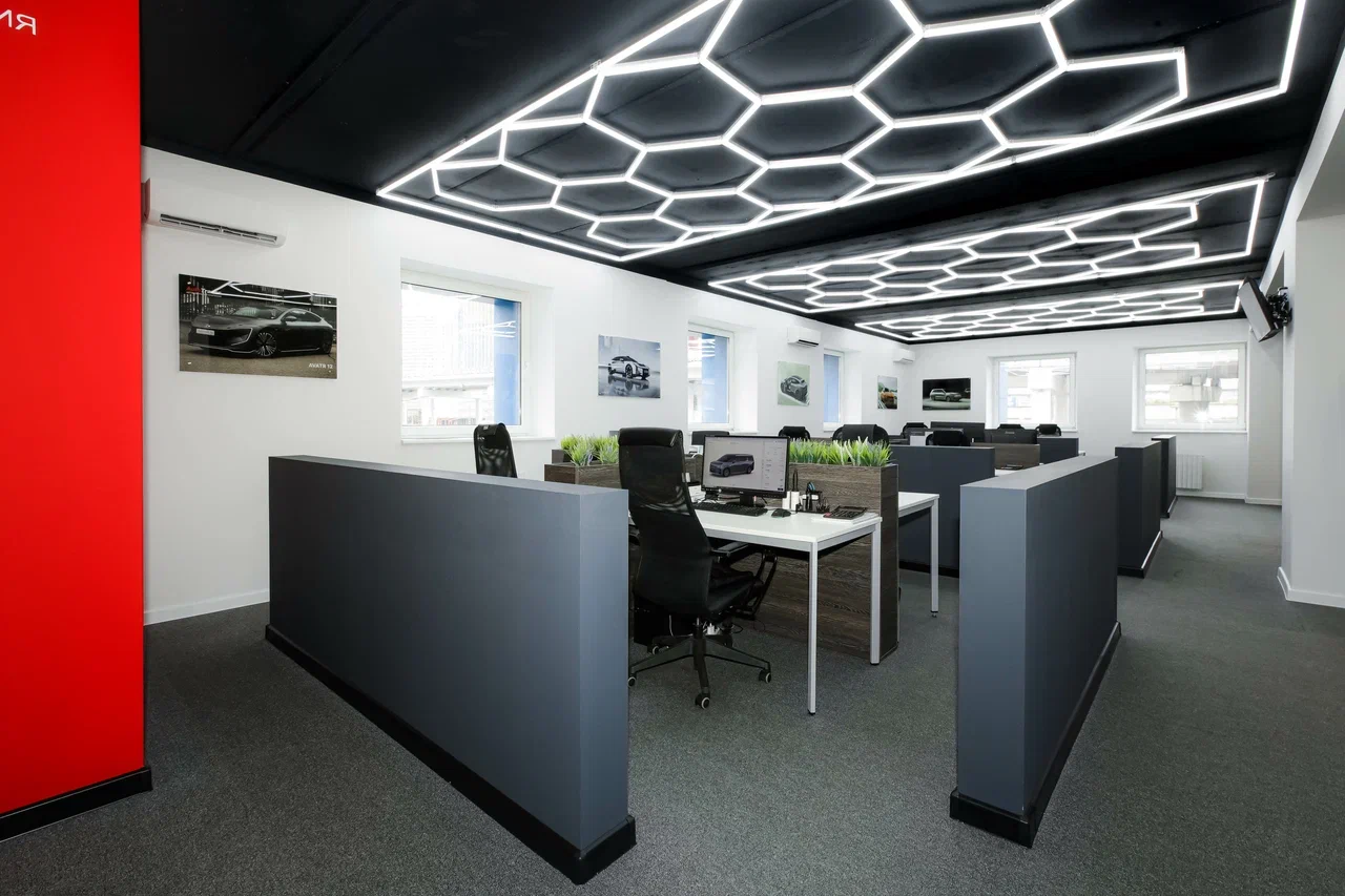 Open workspace of the AutoTrader office with ceiling lighting