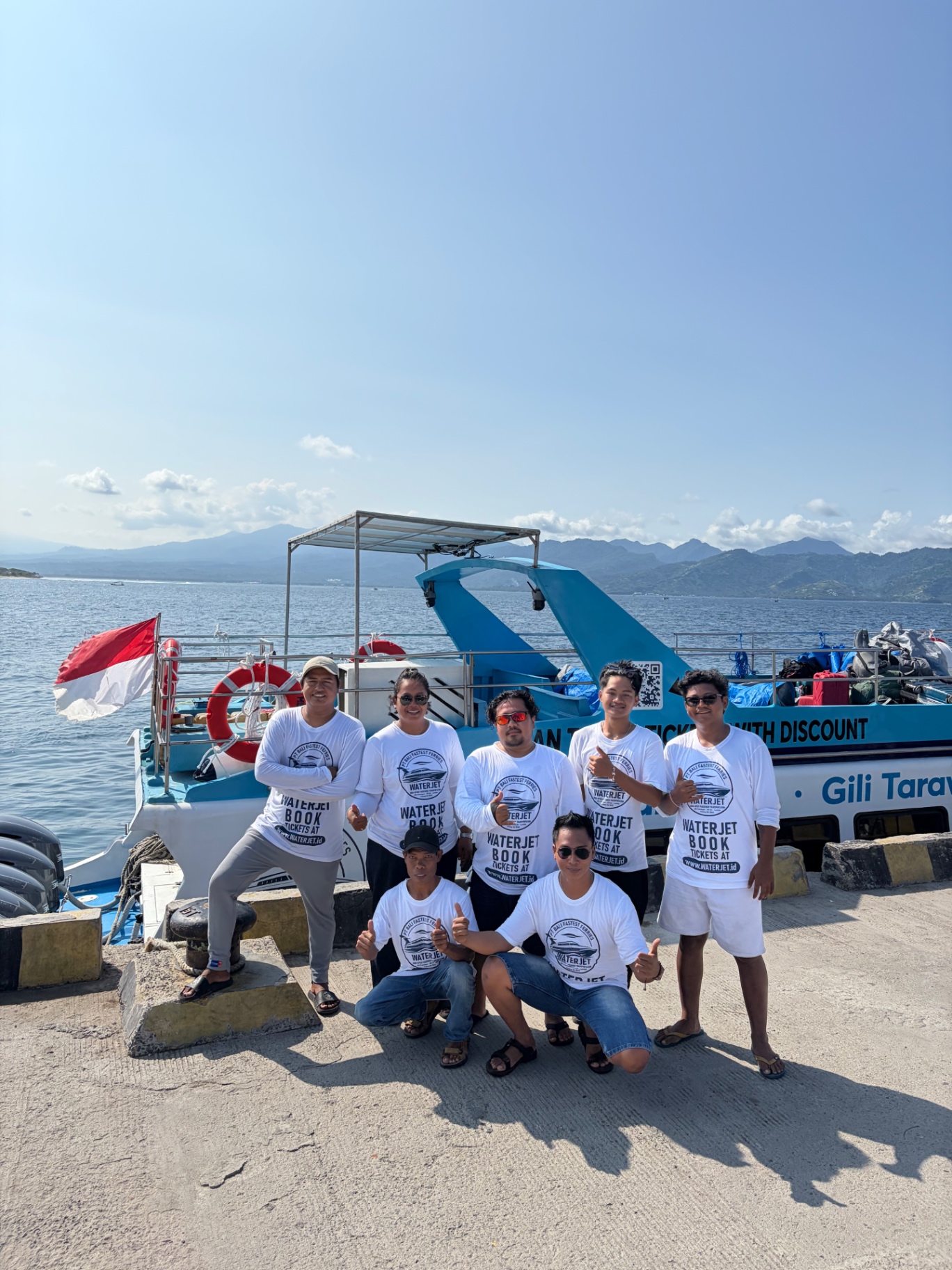 WATERJET.id team next to one of the company's operating boats