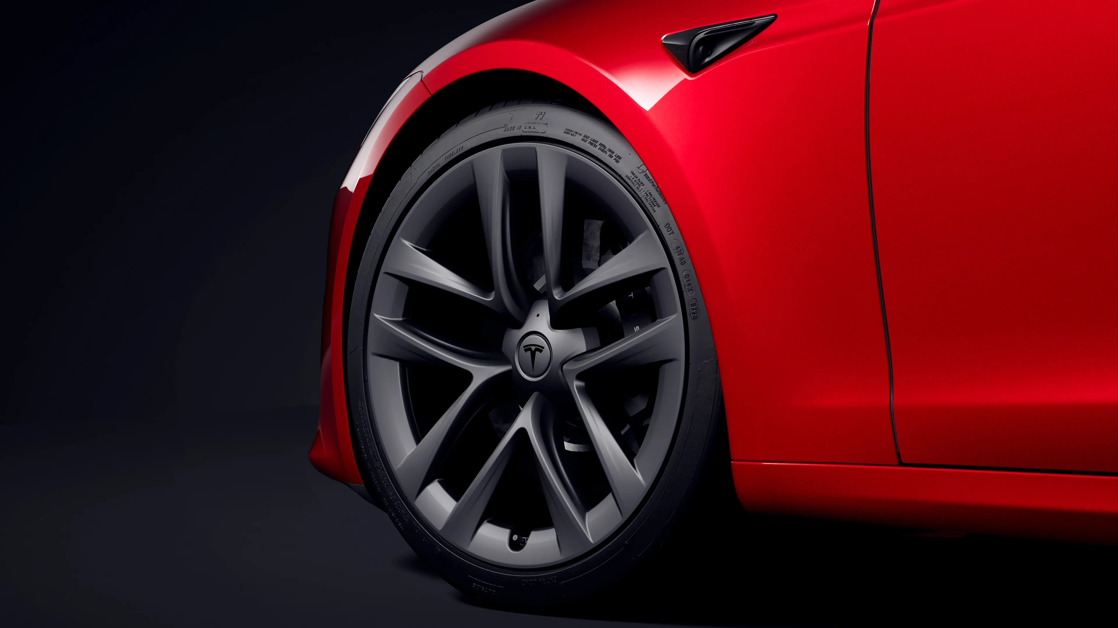 Red Model S front left wheel